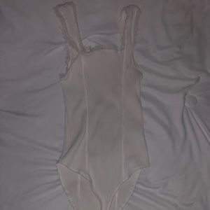 Whit body suit